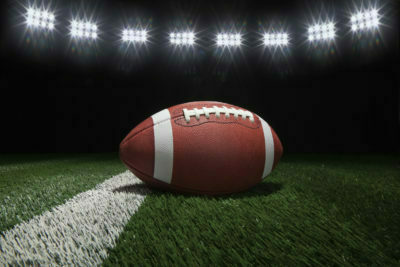 Home 37 a red football on a green surface